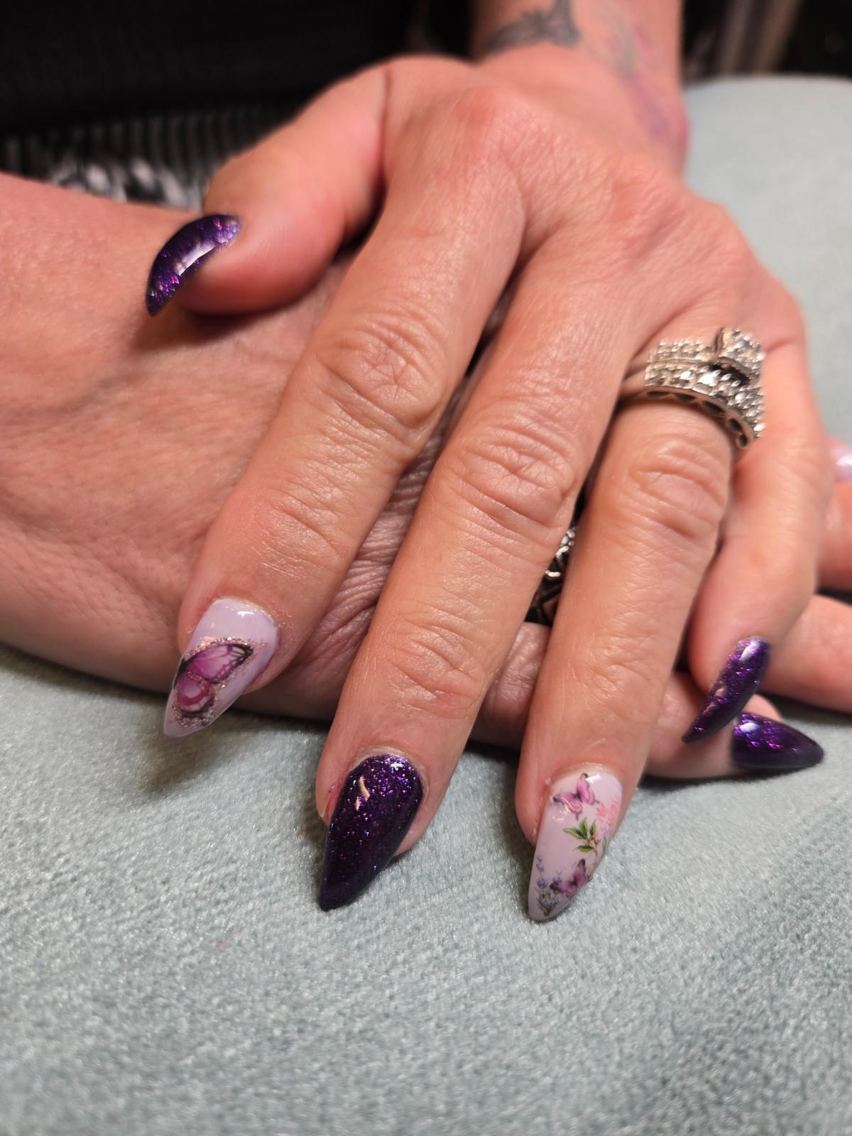 Pink coffin-shape acrylic nails with butterfly accent — Allegro El Paso