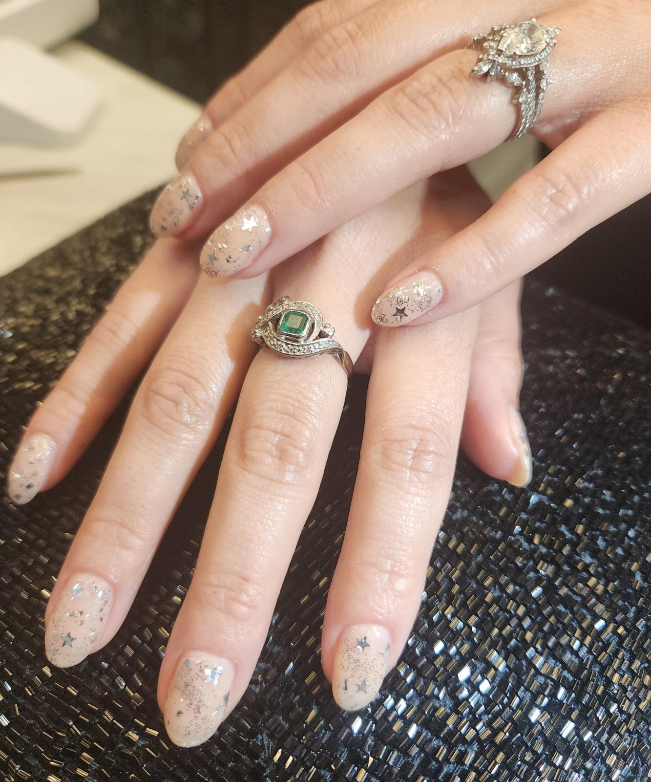 Abstract colorful star-pattern nail design — Allegro Nail Parlour